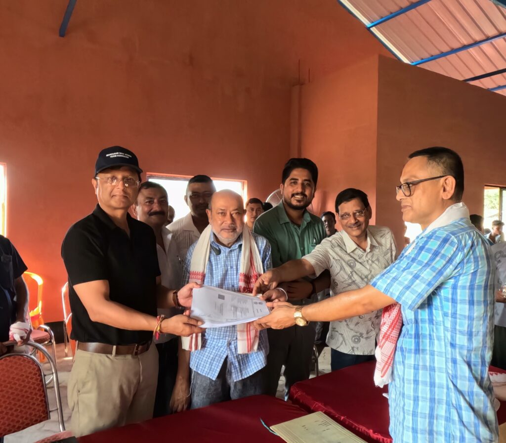 The President and Trustees of SCKC Trust handing over the signed MoU to Mr. Devashish Sharma, DC Morigaon and the Circle Officer of Lahorighat Revenue Circle