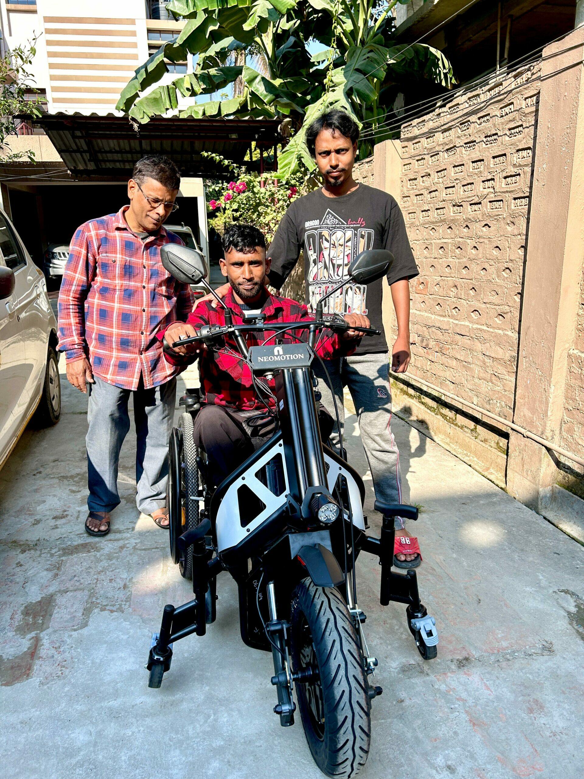 Anowar Hussain with his new NeoMotion motorized wheelchair cum bike